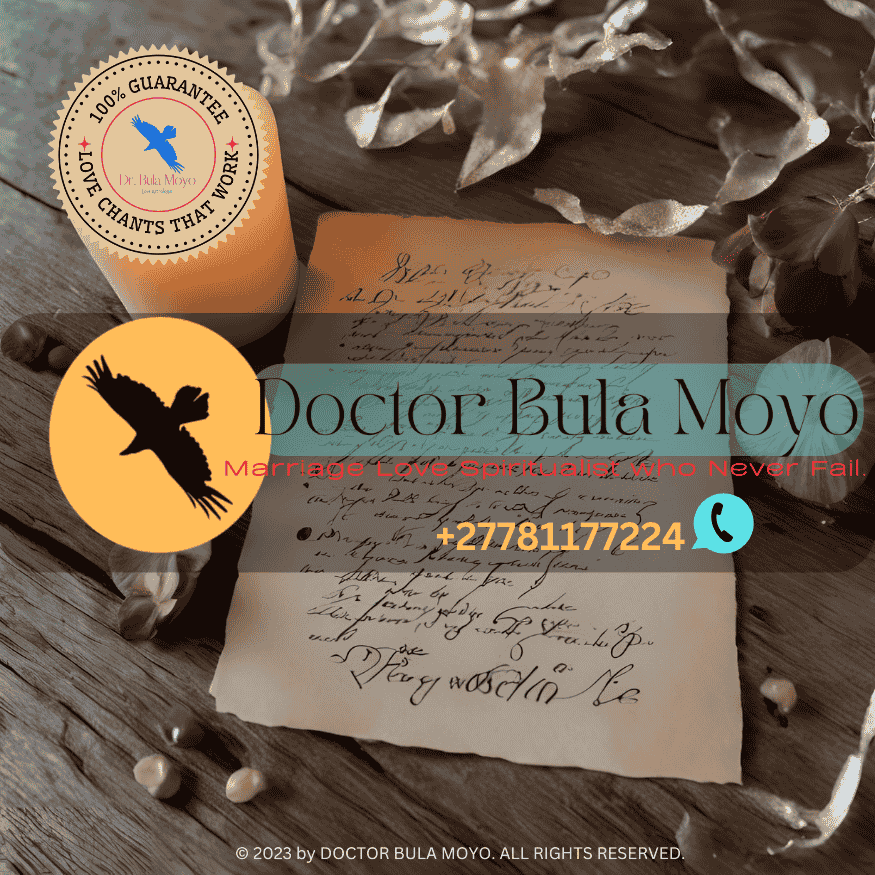 A handwritten love spell intention placed under a glowing candle