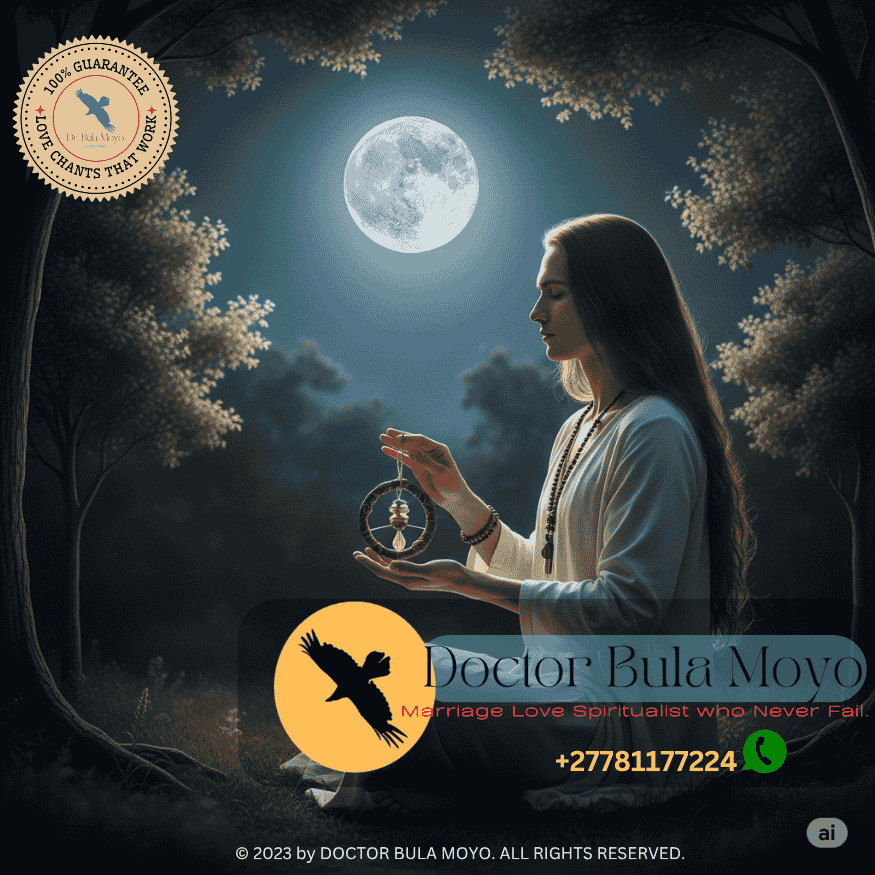 A person meditating with their self-made love amulet under a full moon.