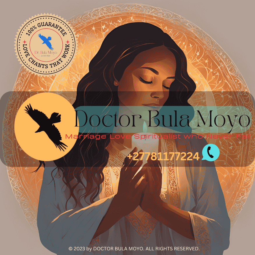 A woman with hands in prayer, surrounded by glowing candlelight, seeking love healing.