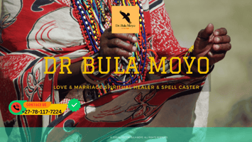 An elderly African spiritual healer holding prayer beads and gazing into the distance. (2)