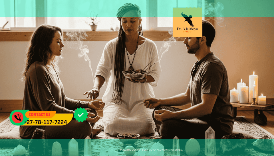 At the Doctor Bula Moyo healing temple a healer performing a couple’s aura shielding ritual using sacred oils and crystals.