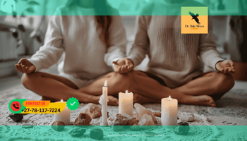 Couple meditating together with candles and crystals during a financial healing ritual.