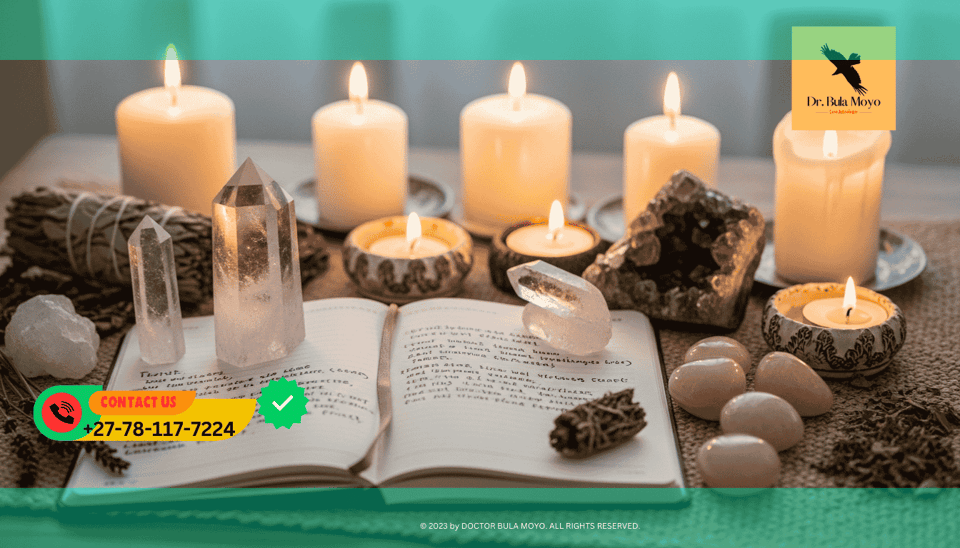 Crystals, candles, and journal arranged for daily aura cleansing and positive energy practices.