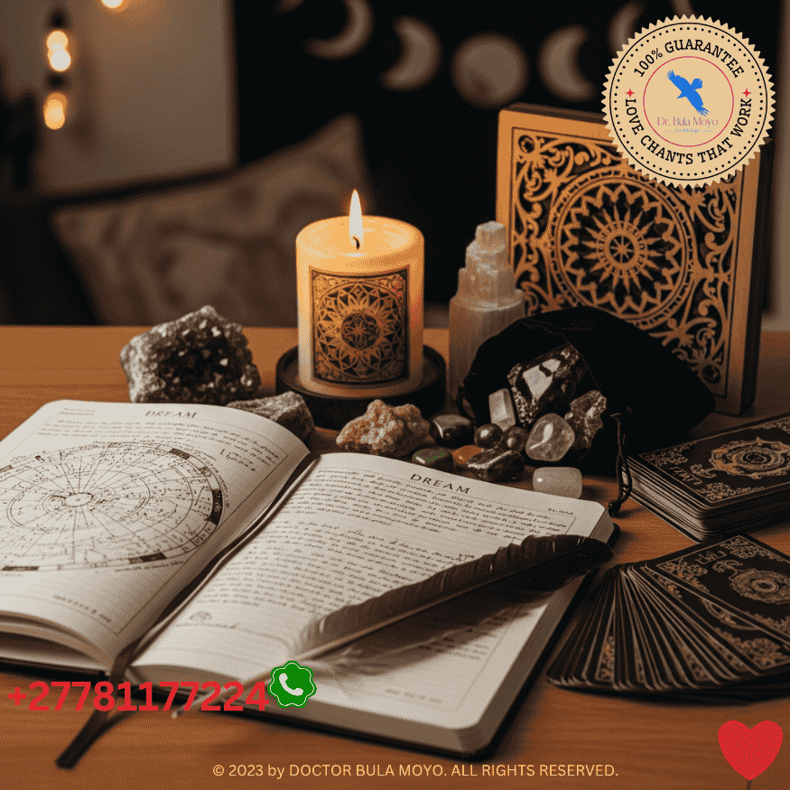 Dream journal and candle setup used for interpreting messages from spirit guides.