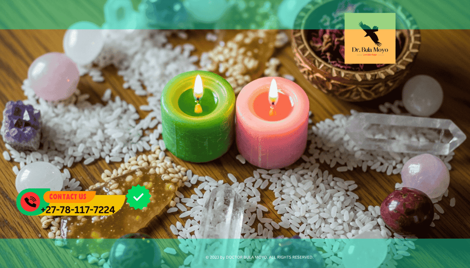 Green and pink candles with honey, rice, and crystals arranged for New Moon love and money spell.