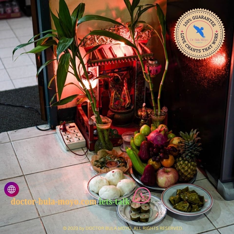Home ancestral altar with traditional offerings.