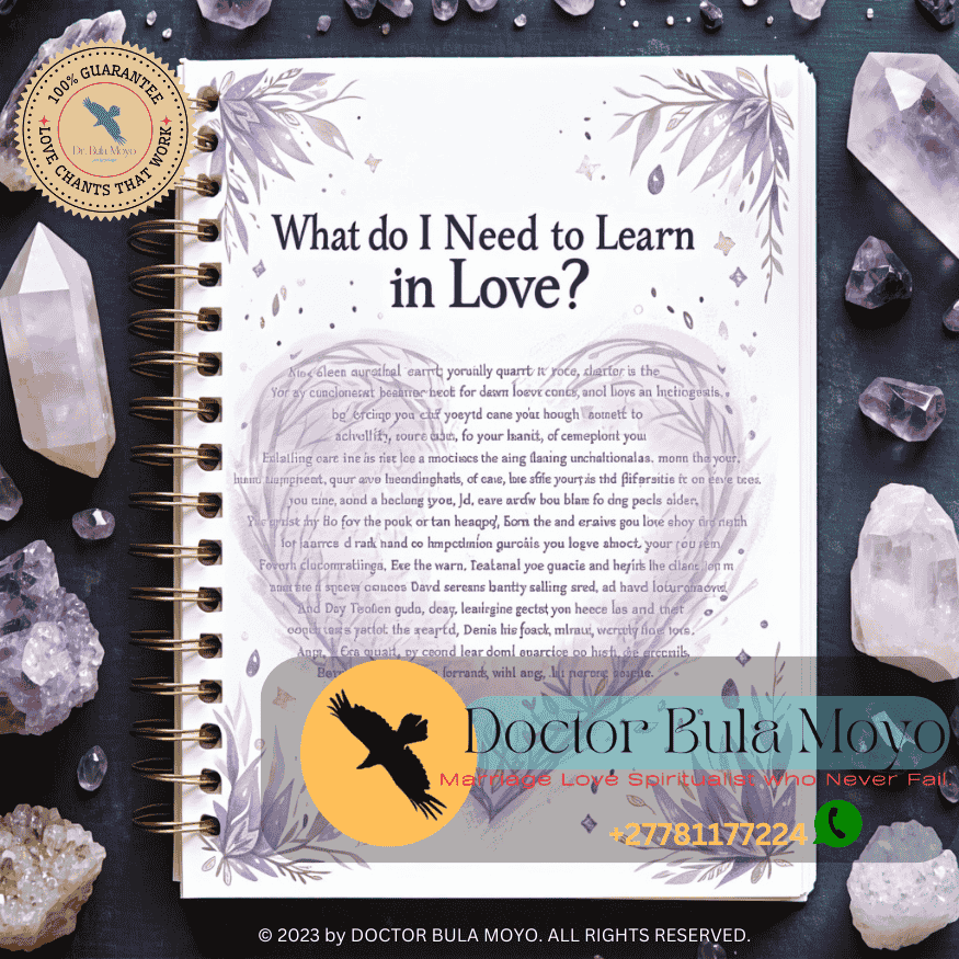 Spiritual journal page titled “What Do I Need to Learn in Love” with crystals beside it. (1)
