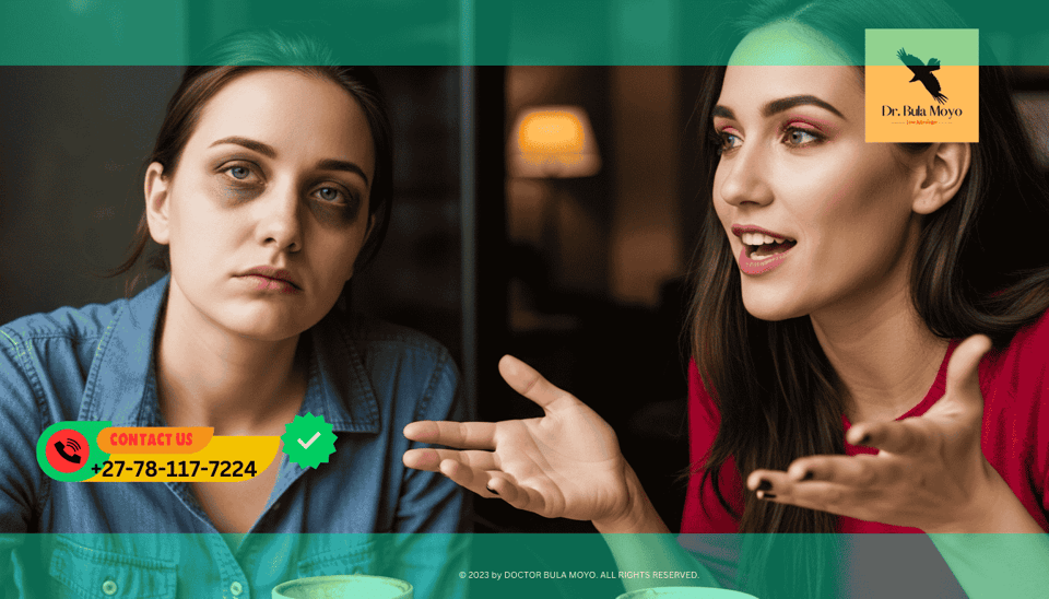 Two people talking, one looking drainedtired Woman feeling drained and exhausted by an energy vampire friend.