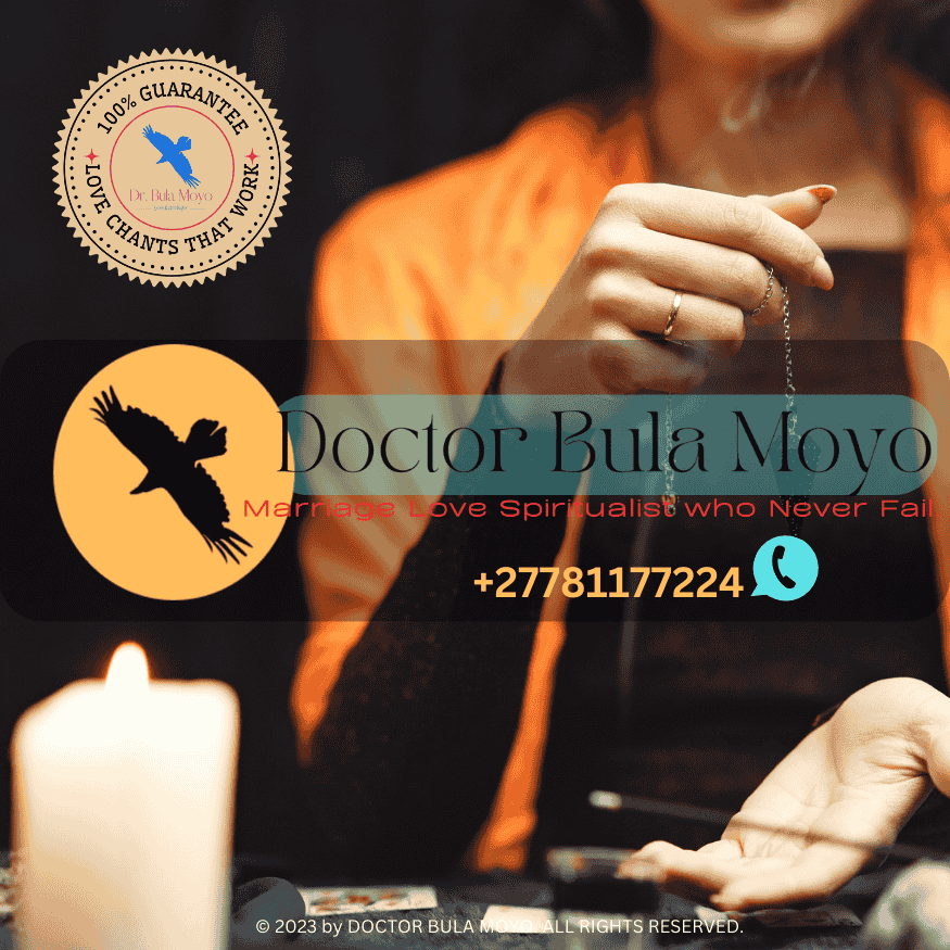 A psychic holding a pendulum over a client’s hand for energy reading.