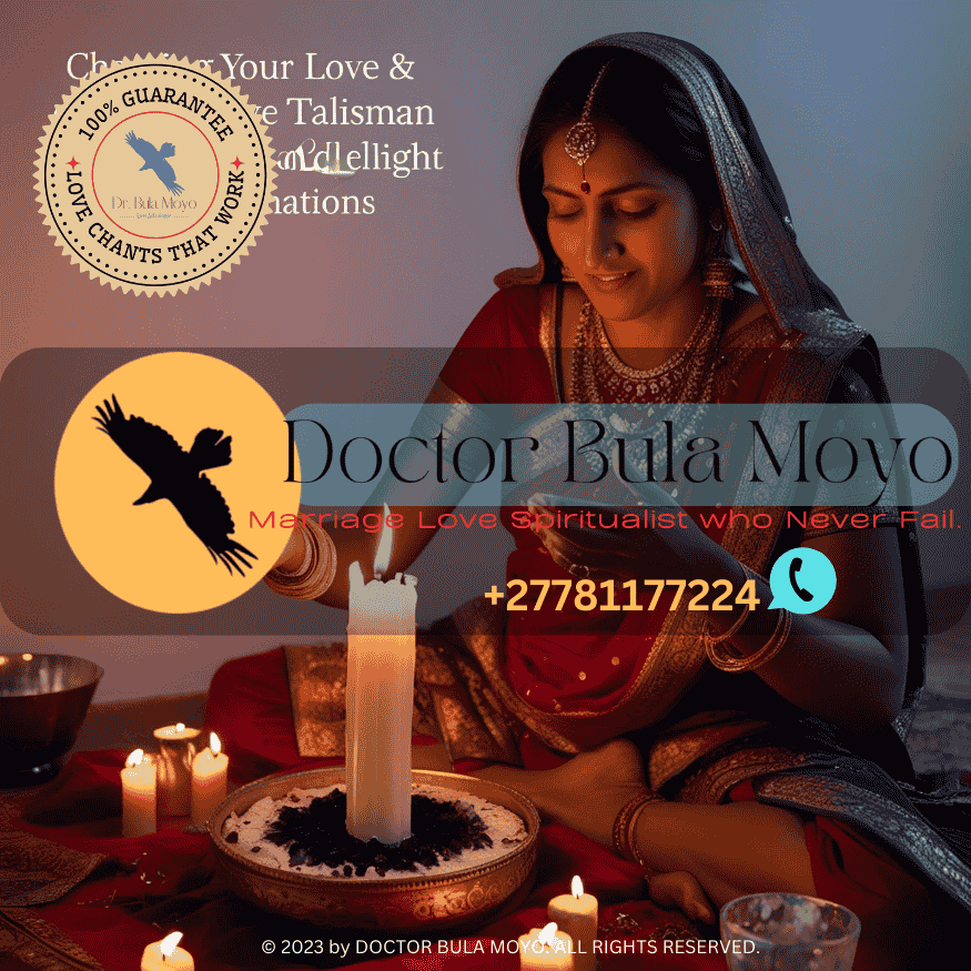 A woman charging her love talisman with candlelight and affirmations