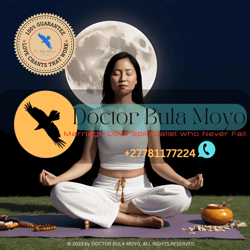 A woman meditating under the full moon for fertility manifestation.
