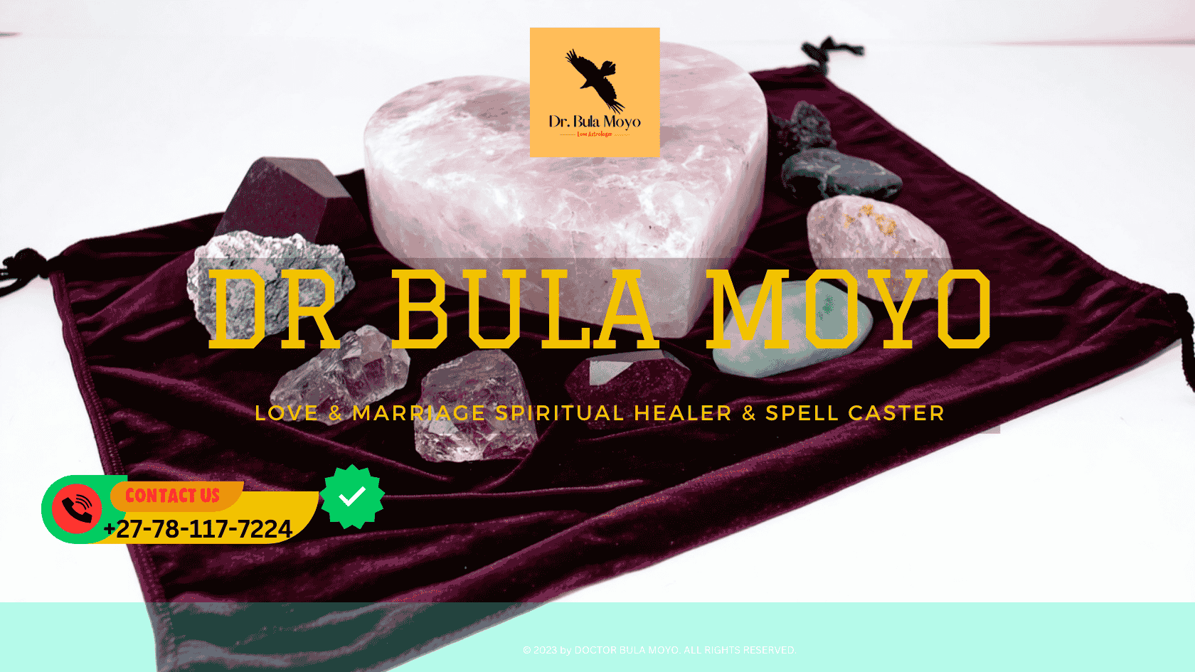 An arrangement of rose quartz, garnet, and aventurine on a velvet love altar 2