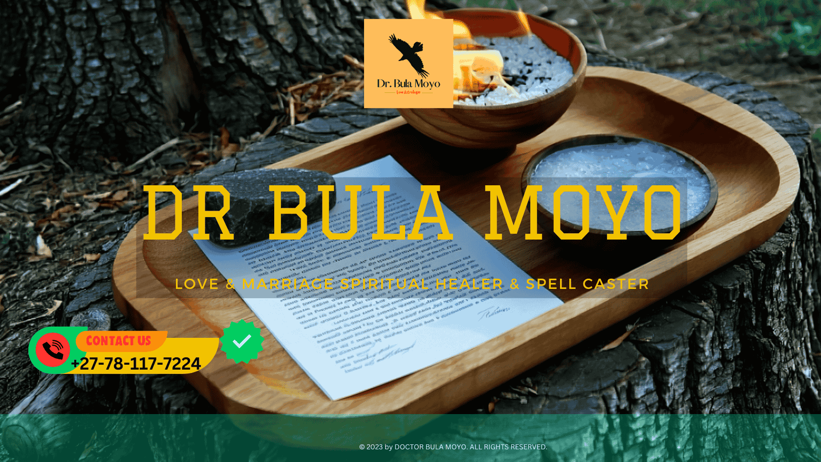 Full moon ritual setup with burning release letter, bowl of water, and black tourmaline placed on a wooden tray outdoors. (1)
