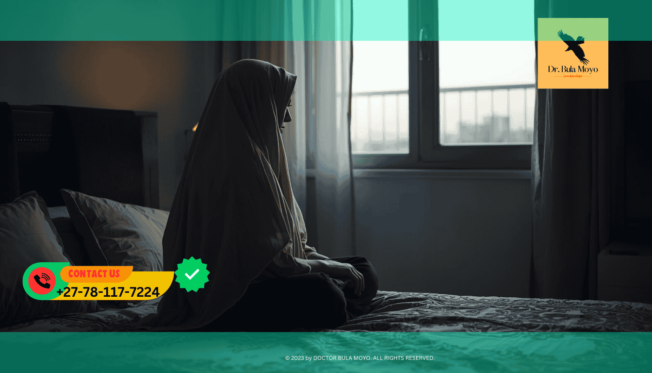 Lonely person sitting on a bed or looking out a window Signs of having a spiritual husband or wife causing singleness.