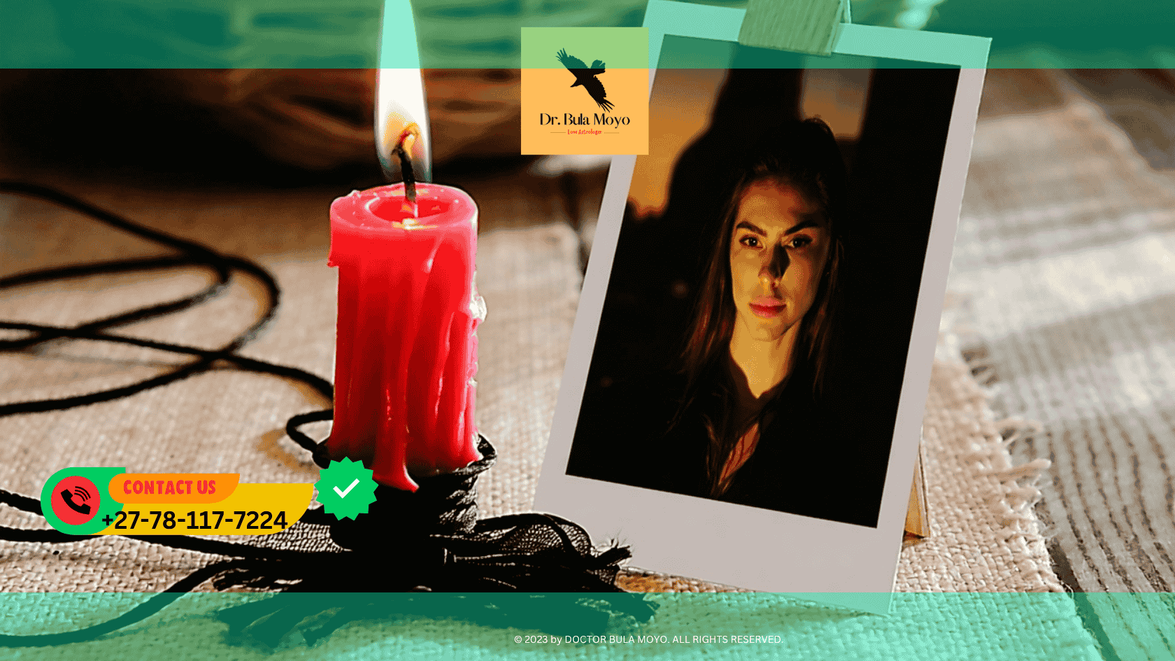 Red candle burning beside a photo and black string used in obsession spellwork (4)