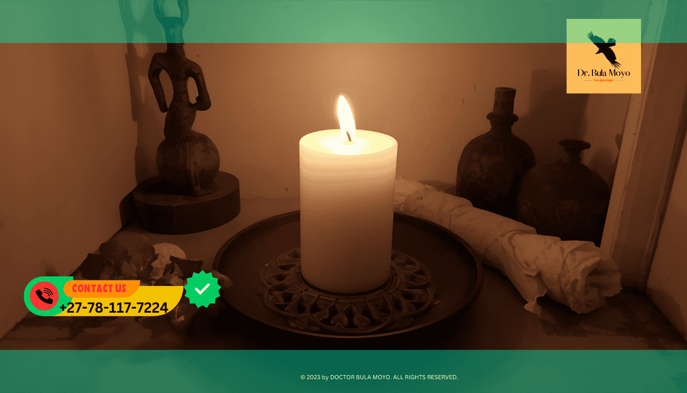 Simple ancestral altar with white candle and water to honor spirits. (1)