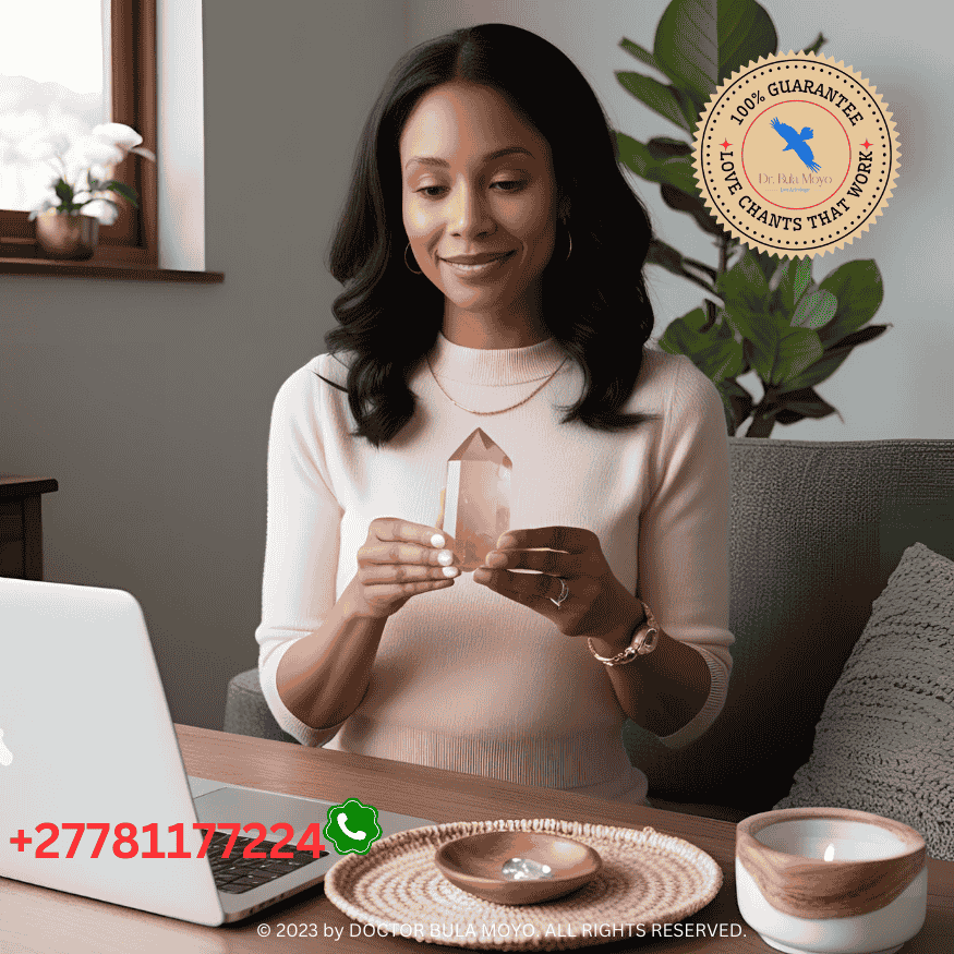 Woman receiving a love reading via video call, holding rose quartz